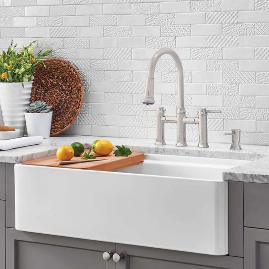 Lifestyle image of Blanco Profina 36" showing included cutting board on step rim edge