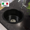 Nantucket Basket Strainer Kitchen Drain for Fireclay Sinks - NS35L-EXT in a black fireclay sink from a top view.