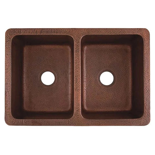 Thompson Quiroga 33" Antique Copper Farmhouse Sink - KDA-3322AH featuring a hand hammered double bowl design.