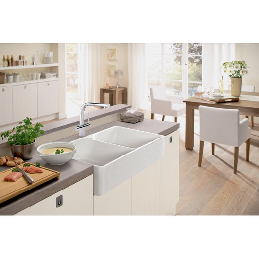Lifestyle image of Franke Manor House 36" Fireclay Farmhouse 50/50 Double Bowl Sink in a kitchen setting