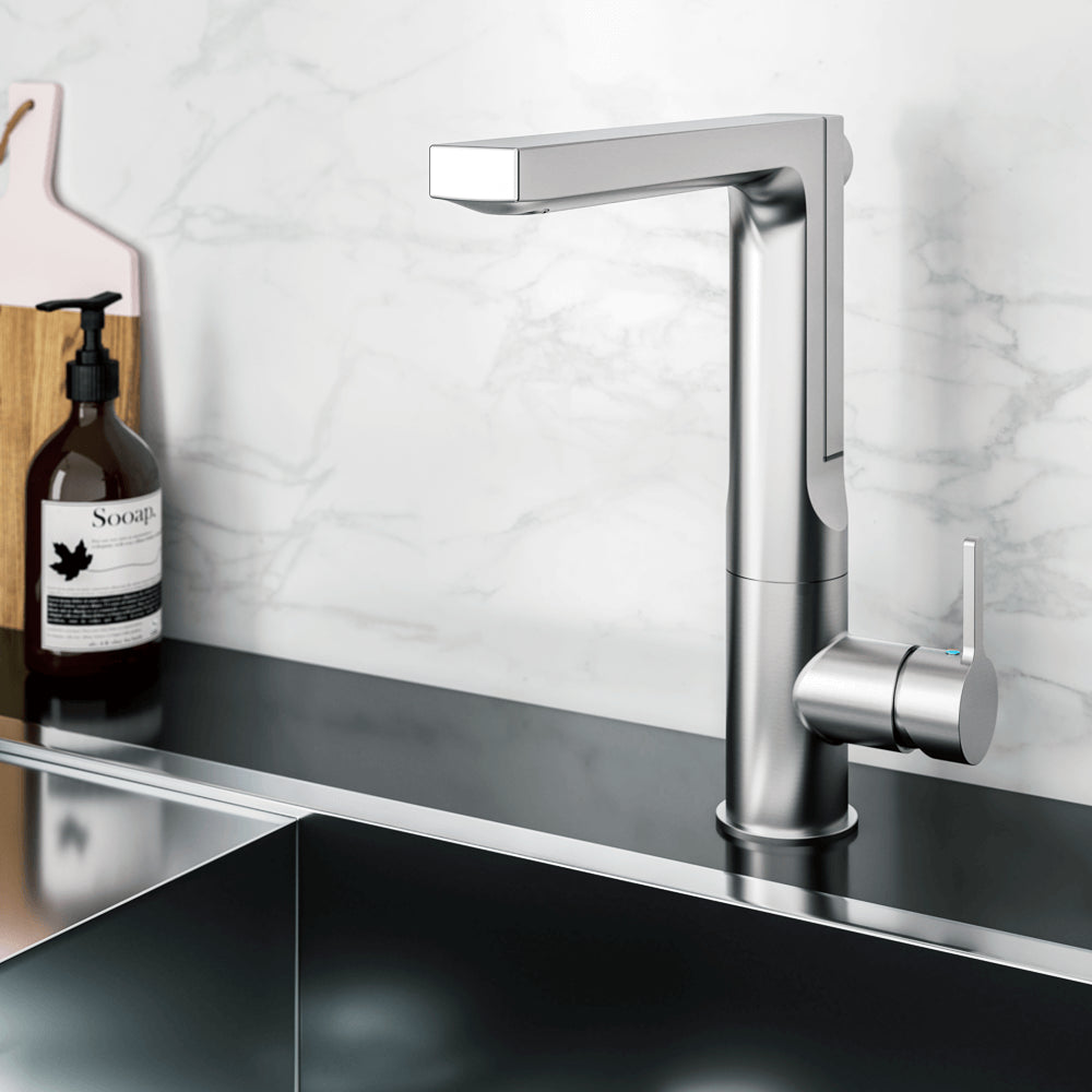 HOUZER ASCEND Matte Black Integrated Single Handle Pull-Up Kitchen Faucet in modern kitchen setting with sleek design.