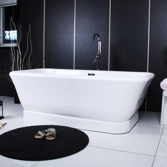 Lifestyle image of the Aqua Eden Freestanding bathtub in a modern bathroom showing profile and overflow