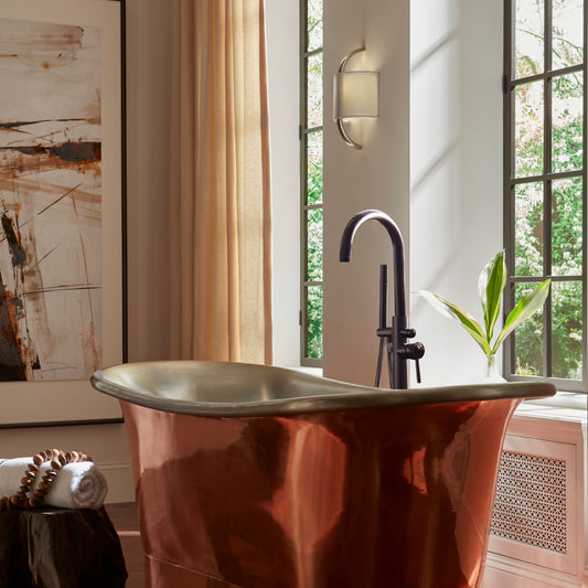 Lifestyle image of Thompson Traders' Coba Copper & Nickel master bathroom freestanding tub
