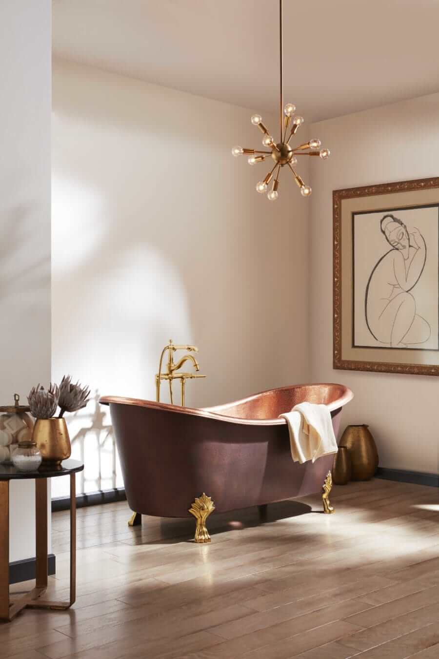 Thompson Cupatitzio Handcrafted Antique Exterior & Solid Brass Feet 14 Gauge in a modern bathroom setting.