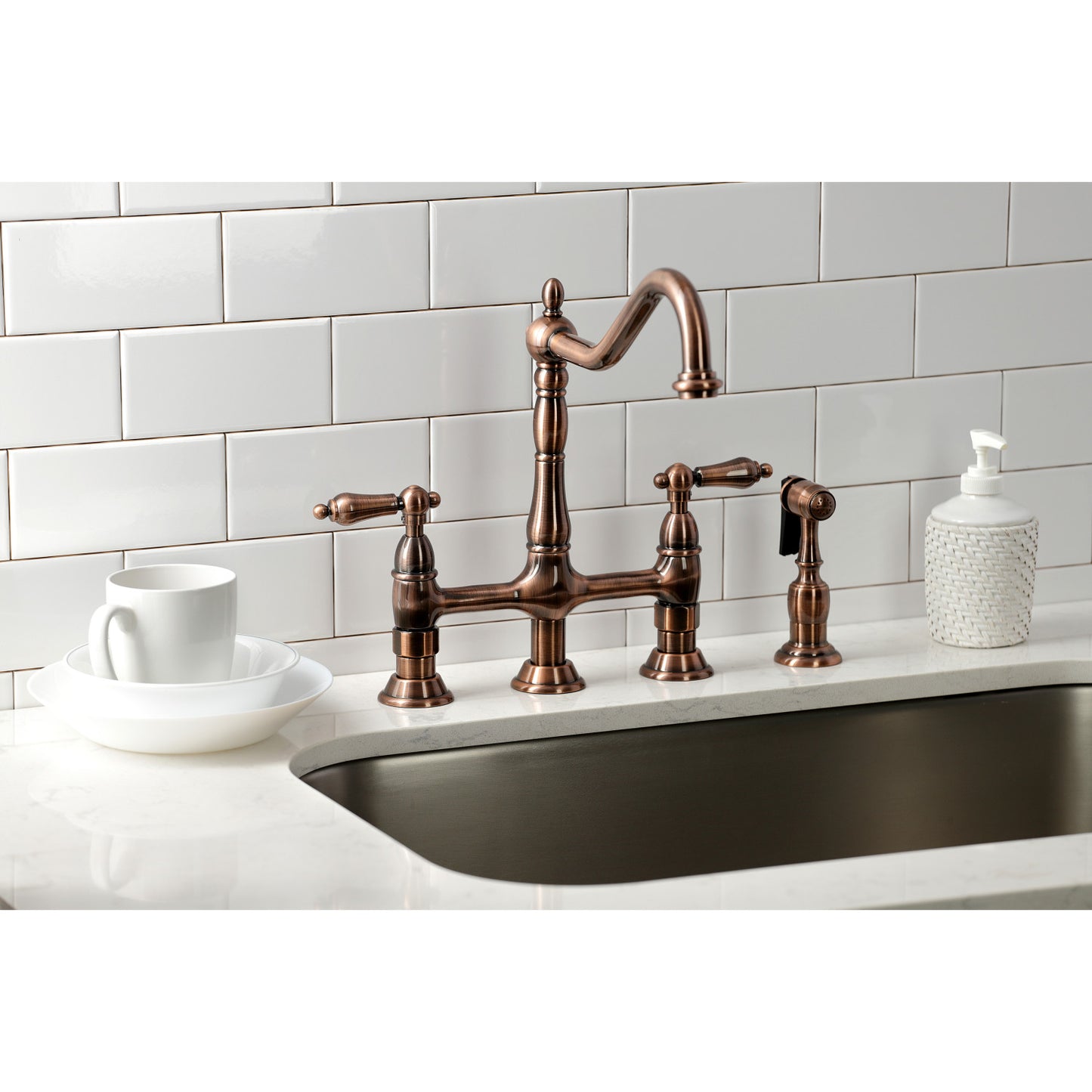 KINGSTON Brass Heritage Bridge Kitchen Faucet with Brass Sprayer right side view showcasing traditional design and sprayer.