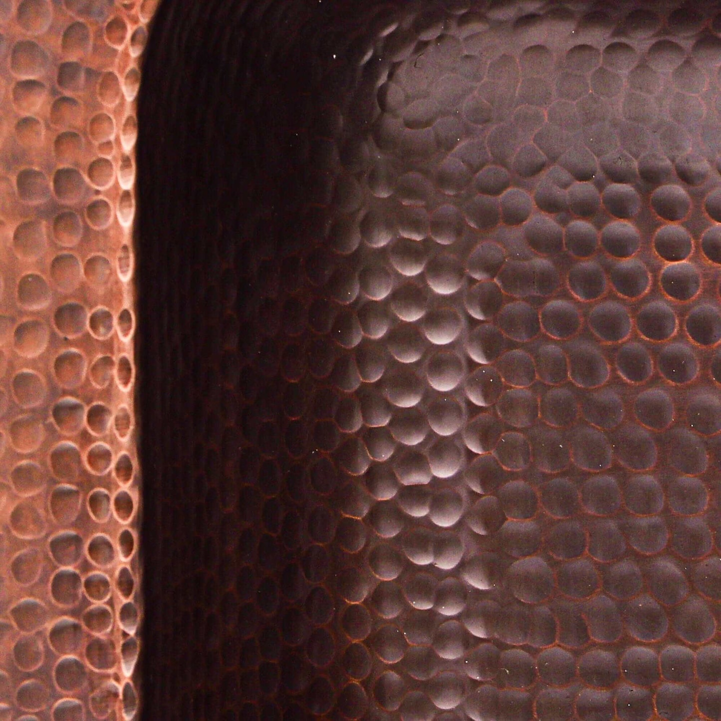 Close-up of the unique texture of the Nantucket Sinks 17" Hammered Copper Rectangle Bar Sink - REHC-2.5.