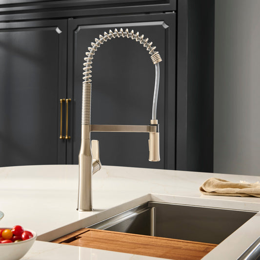 Ruvati RVF1233 Bianca Single-Handle Tall High-Arc Commercial Kitchen Faucet with Pre-Rinse Sprayer in kitchen.