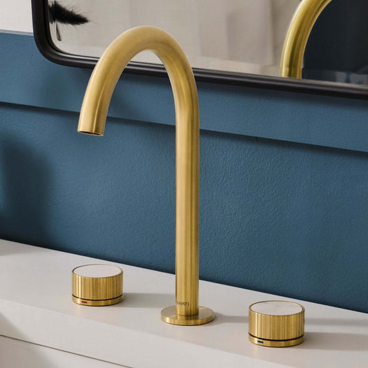 Ruvati RVF5232 Athena Two-Handle Widespread Bathroom Faucet with Stone Detail in Brushed Gold finish.