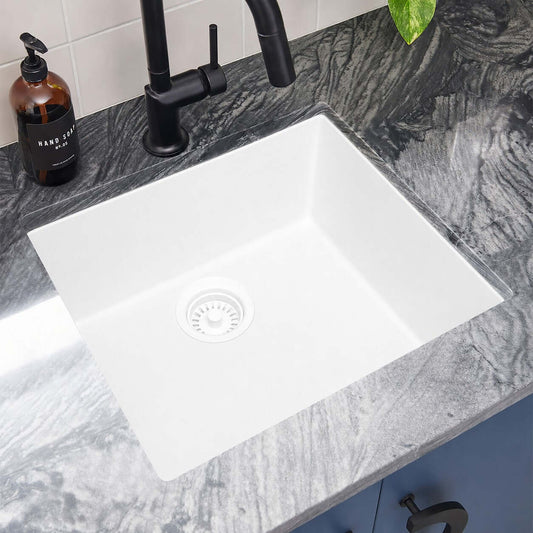 Ruvati RVG2018 17" Square Granite Composite Undermount Bar Prep Sink installed on a stylish countertop.