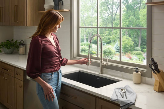 Ruvati RVG2306 32" Granite Composite Undermount Workstation Kitchen Sink in a modern kitchen setting.