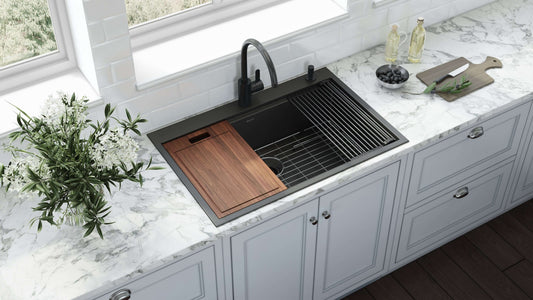 Ruvati Giana 33" Workstation Stainless Steel Kitchen Sink RVH5003BL in stylish kitchen setup with marble countertop.