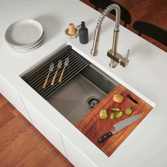 Ruvati 30" Giana Nano-PVD Workstation Kitchen Sink Undermount - RVH6530 with cutting board and utensils on a kitchen countertop.