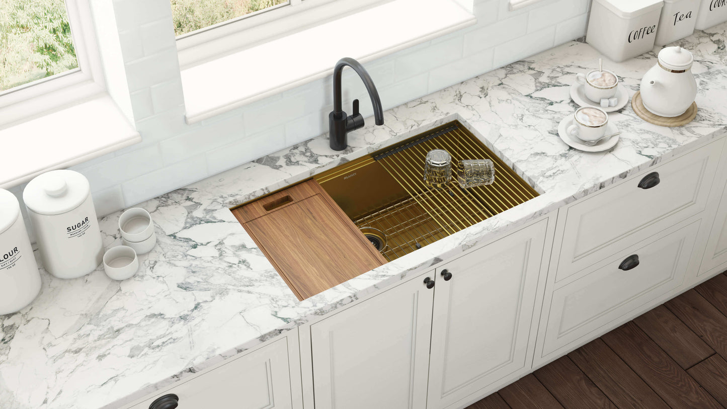 Ruvati 33" Giana Nano-PVD Workstation Kitchen Sink Undermount - RVH6533 with wood cutting board and drying rack on marble countertop.