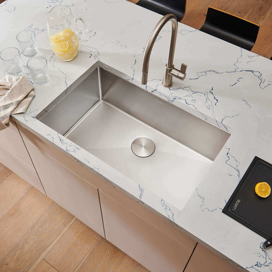 Ruvati 30" Gravena Single Bowl Undermount Kitchen Sink - RVH7300 in a modern kitchen setup with a marble countertop.