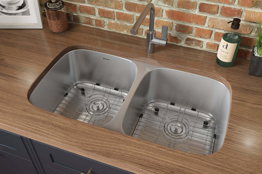 Ruvati 32" Undermount Kitchen Sink 50/50 Double Bowl - RVM4300 view with classic curved corners and basin grids.