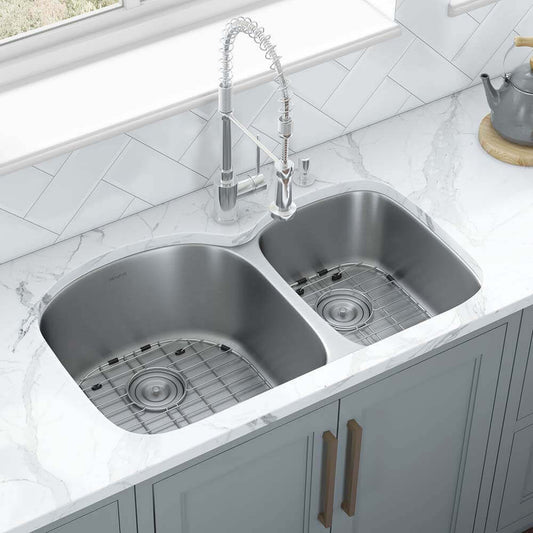 Ruvati 34" Undermount Kitchen Sink 60/40 Double Bowl - RVM4600 with polished stainless steel finish and reversible sink grid.