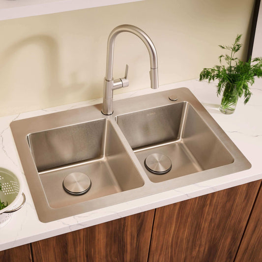 Ruvati 33" Topmount Kitchen Sink 50/50 Double Bowl - RVM5150 with stainless steel finish and modern faucet.