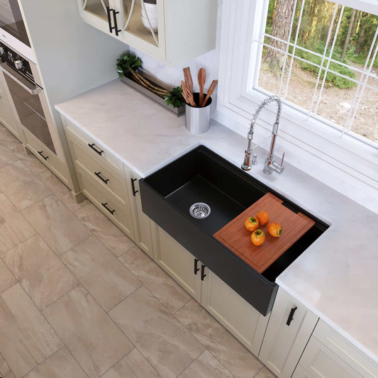 Nantucket T-PS36MB matte black fireclay sink side angle showing workstation ledge system