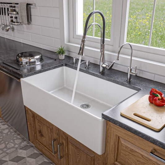 ALFI 36" Smooth Apron Single Bowl Fireclay Farm Sink AB536-W installed in a modern kitchen setting.