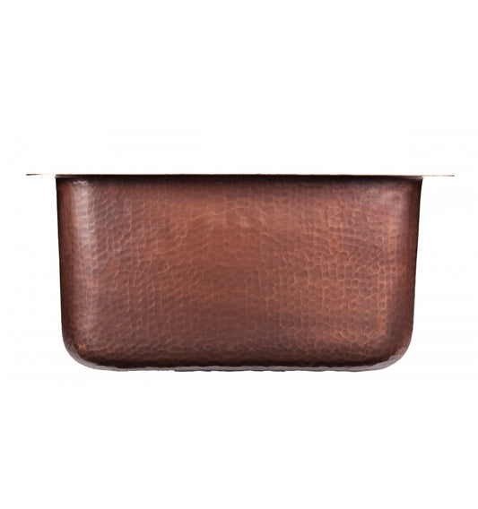 Hand-hammered antique copper finish on the Thompson Rivera square bar sink, KPU-1715HA