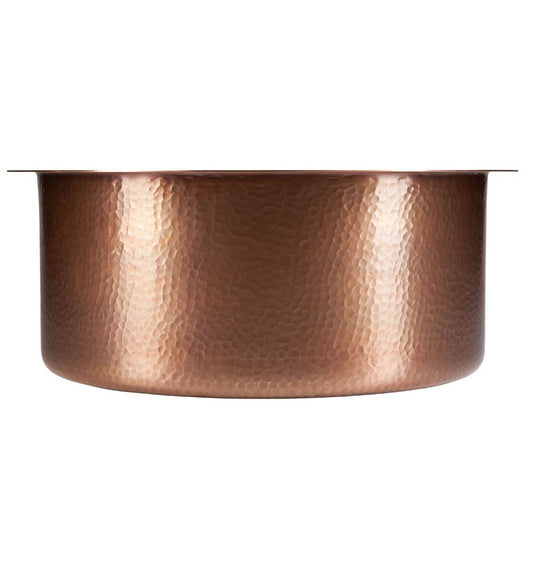 Hand-hammered antique copper finish on the Thompson De La Cruz round bar sink, PU-1708MA
