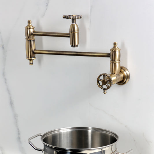 Kingston Brass KS3103CG Fuller Wall Mount Pot Filler Faucet, Antique Brass with a pot underneath.