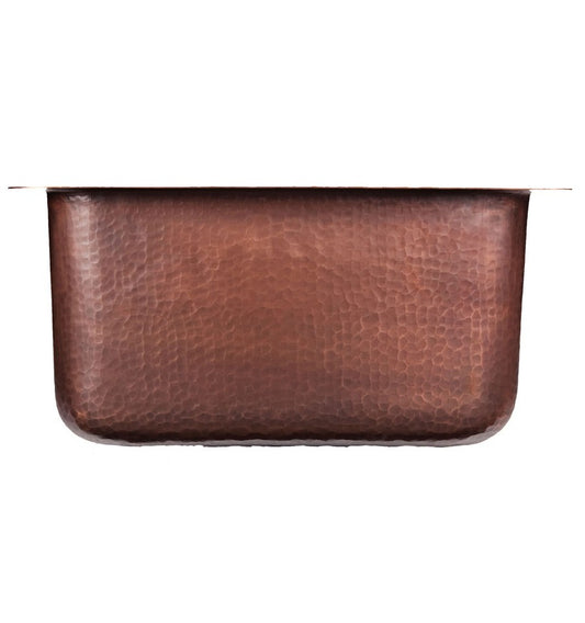 Hand-hammered aged copper finish on the Thompson Rivera square bar sink, KPU-1715BC