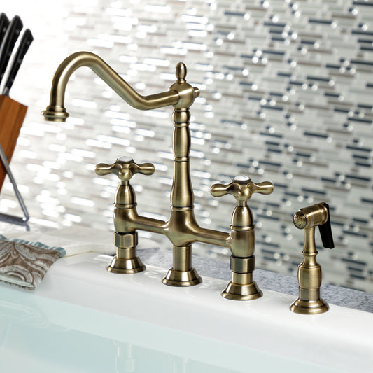 Kingston KS1273AXBS Heritage Bridge Kitchen Faucet with Brass Sprayer, Antique Brass on white countertop