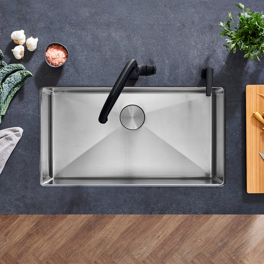 BLANCO Quatrus R15 32" Super Single Bowl Undermount Stainless Steel Kitchen Sink with modern faucet and fresh ingredients.