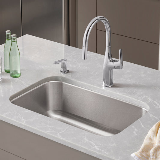BLANCO Stellar 32" Single Bowl Undermount Stainless Steel Kitchen Sink with modern faucet on a marble countertop.