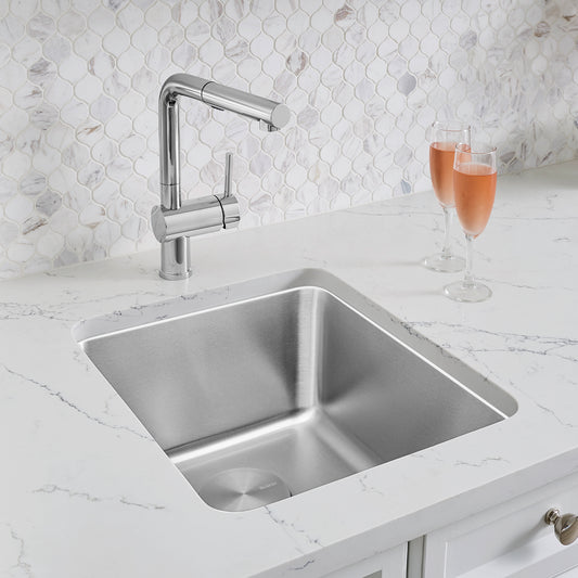 BLANCO Formera 16" Undermount Stainless Steel Bar Sink in contemporary kitchen with modern faucet and decorative backsplash.
