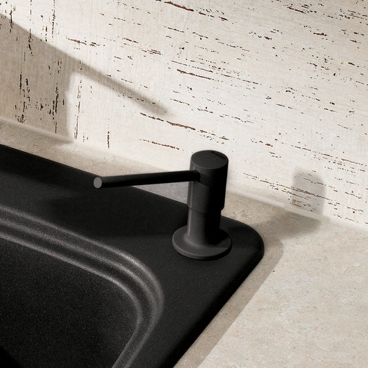 Torre Soap Dispenser - Anthracite on a kitchen sink countertop showcasing its sleek design and functional elegance.