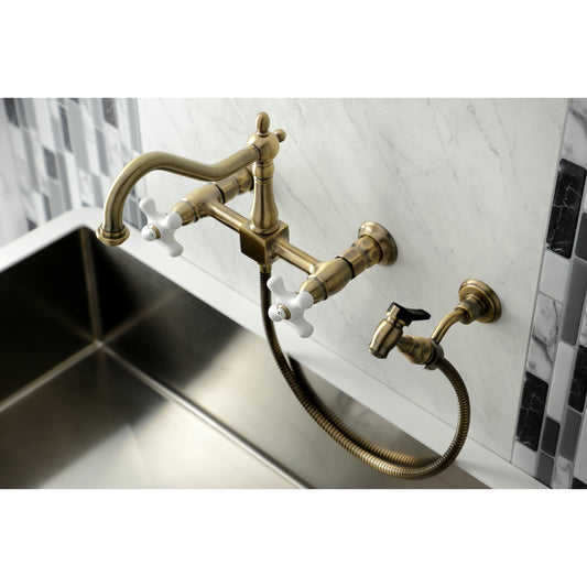 Kingston KS1243PXBS Heritage Two-Handle Wall Mount Bridge Kitchen Faucet with Brass Sprayer, Antique Brass