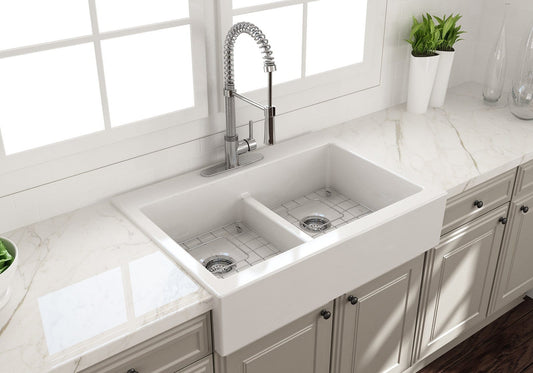 BOCCHI NUOVA Farmhouse Short Apron Front Fireclay 34" Double Bowl Kitchen Sink right side view with modern faucet.
