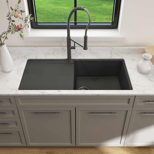 BOCCHI LEVANZO 20" Granite Kitchen Sink with Drain Board in a modern kitchen setting with marble countertop.