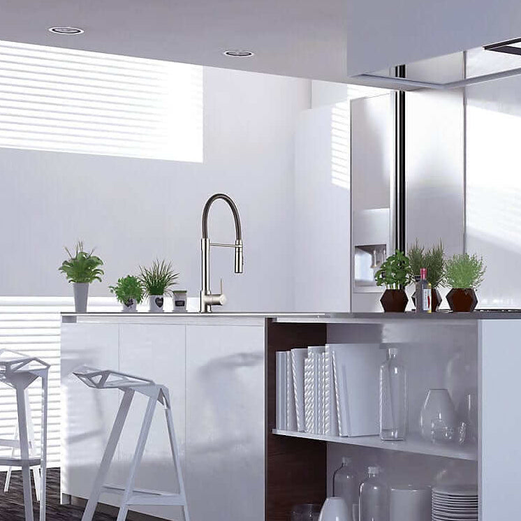 FORTIS Culinary Single Handle Pull-Down Kitchen Faucet in Brushed Nickel showcased in a modern kitchen setting with stylish decor.