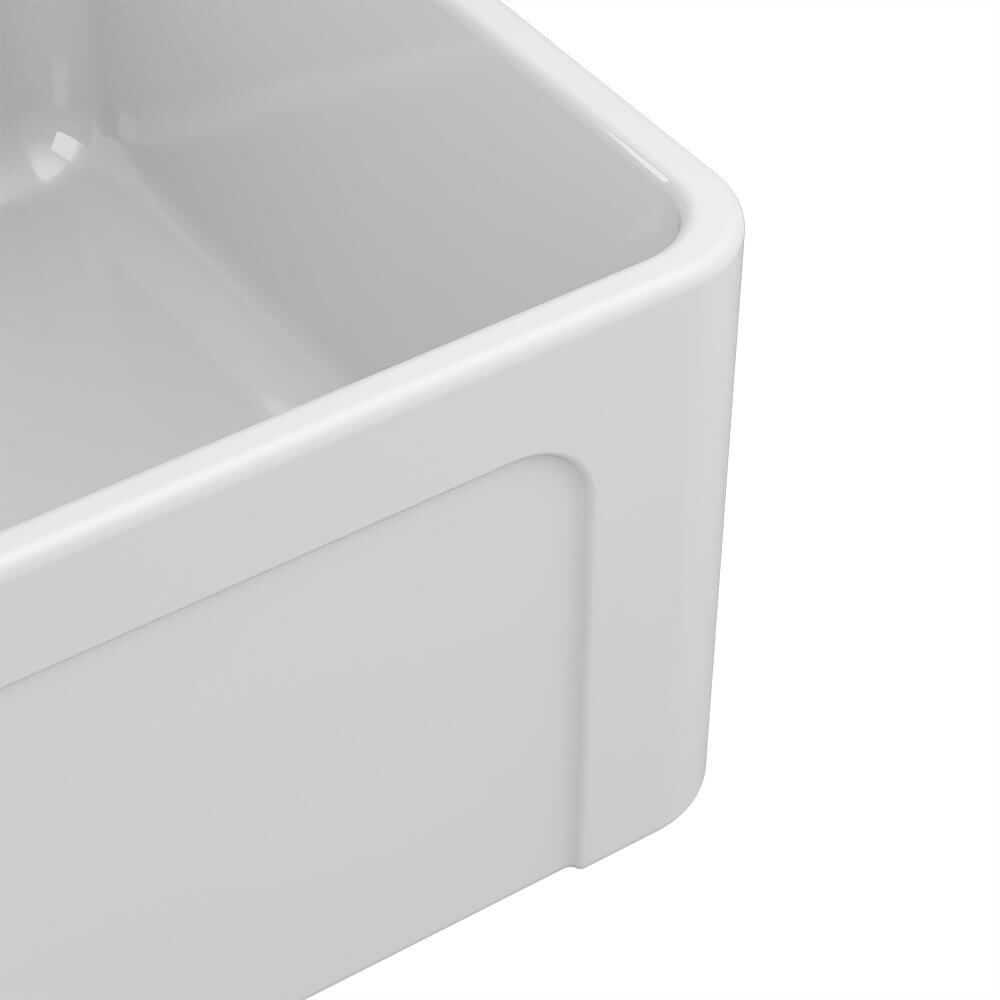Latoscana 30" Reversible Fireclay Single Bowl Farmhouse Sink - LTW3019W close-up view of a white sink corner.