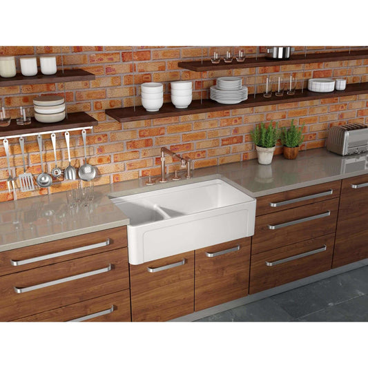 Latoscana 36" Reversible Fireclay Double Bowl 60:40 Farmhouse Sink with Accessory Ledge in kitchen setting, front view.