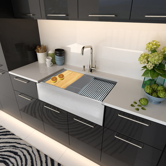 Nantucket 33" Reversible Workstation Granite Composite Apron Sink with Accessory Pack - PR3320-APS-G installed in a modern kitchen.