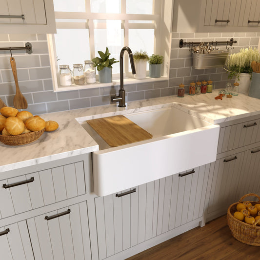 Nantucket 33" Reversible Workstation Granite Composite Apron Sink with Accessory Pack - PR3320-APS-W in a modern kitchen setting.