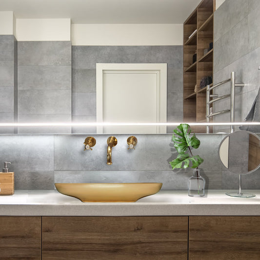 Nantucket Dubai Italian Fireclay Vanity Sink - RC79040G showcased in a modern bathroom setting with gold fixtures.