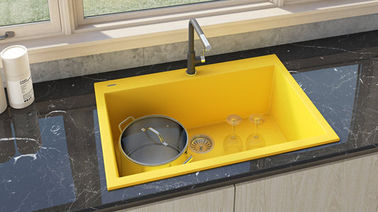 Ruvati epiGranite 33" Drop-in Granite Kitchen Sink RVG1080YL in vibrant Midas Yellow with modern faucet and decor.