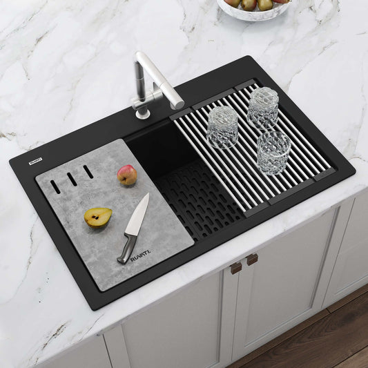 Ruvati epiStage 33" Workstation Drop-in Granite Kitchen Sink RVG1302BK with a cutting board and glasses.
