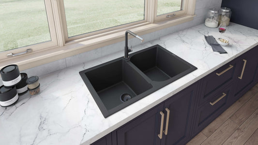 Ruvati epiGranite 34" Granite Composite Kitchen Sink RVG1319BK displayed in a modern kitchen with marble countertop.