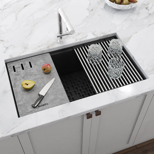 Ruvati epiStage 33" Workstation Granite Kitchen Sink RVG2302BK features a sleek design with a cutting board and drying rack.