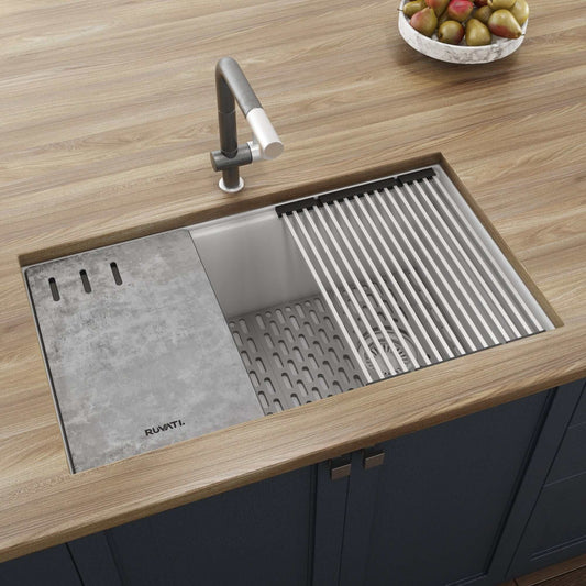Ruvati epiStage 33" Workstation Granite Kitchen Sink RVG2302WH displayed in a modern kitchen countertop.