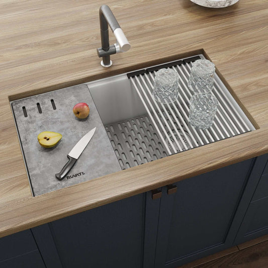 Ruvati epiStage 33" Workstation Granite Kitchen Sink RVG2302WH with cutting board and accessories.