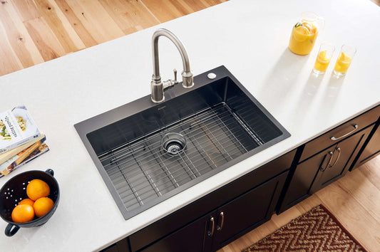 Ruvati Terraza 33" Drop-in Stainless Steel Kitchen Sink RVH5005BL with modern faucet and accessories in kitchen.