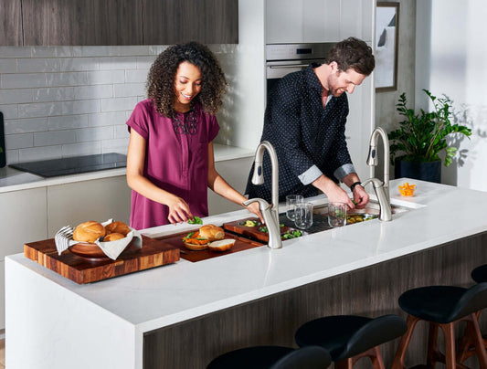 Ruvati 45" Workstation Dual Tiered Ledge Kitchen Sink Stainless Steel RVH8333 used for food prep in modern kitchen.