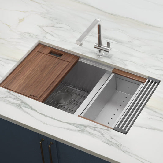 Ruvati Roma 33" Workstation Ledge Stainless Steel Kitchen Sink RVH8356 with wooden cutting board and sleek design.